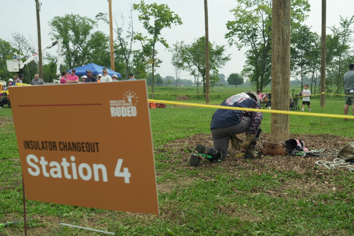 A lineman prepares for the Insulator Change event during the Indiana Electric Cooperative 2023 Lineman Rodeo at the Hendricks County Fairgrounds.