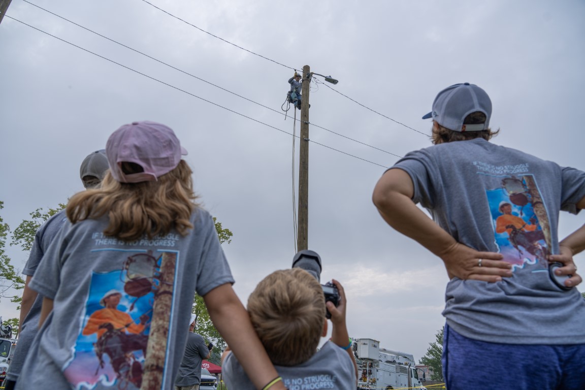 Friends and family members look on during competition at the 2023 Indiana Electric Cooperative Lineman Rodeo at the Hendricks County Fairgrounds.